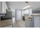Kitchen with granite countertops and stainless steel appliances at 5380 Rock Place Drive, Stone Mountain, GA 30087
