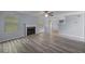 Living room featuring a fireplace and an open layout at 5380 Rock Place Drive, Stone Mountain, GA 30087