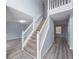 Bright foyer area with staircase, hardwood floors, and natural light at 5380 Rock Place Drive, Stone Mountain, GA 30087
