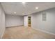 Spacious unfinished basement offers neutral carpet and plenty of potential for customization at 6797 Braswell Mountain Rd, Rockmart, GA 30153