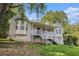 Exterior view showing a charming home with a front porch and bay windows at 6797 Braswell Mountain Rd, Rockmart, GA 30153