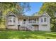 Charming home showcasing a quaint front porch and beautiful bay windows at 6797 Braswell Mountain Rd, Rockmart, GA 30153