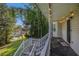 Inviting front porch with steps leading up to the entrance and string lights at 6797 Braswell Mountain Rd, Rockmart, GA 30153