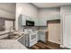Kitchen showcasing light wood cabinets, appliances, counters, and sink at 6797 Braswell Mountain Rd, Rockmart, GA 30153