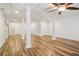 Spacious basement with wood flooring, support columns, and recessed ceiling at 169 Robson Trl, Mcdonough, GA 30252