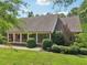 Lovely brick home with a cozy front porch, perfect for relaxing outdoors at 169 Robson Trl, Mcdonough, GA 30252