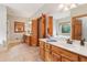 Main bathroom features double sink vanity and a separate soaking tub at 169 Robson Trl, Mcdonough, GA 30252