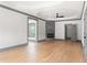 A primary bedroom features hardwood floors, modern trim, and a fireplace for a touch of warmth at 2369 Mcafee Rd, Decatur, GA 30032