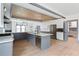 Modern kitchen with gray cabinets, stainless steel appliances, and a large island at 2369 Mcafee Rd, Decatur, GA 30032