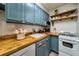 Well-equipped kitchen with modern appliances, counter space, and cabinetry at 2805 Ne Expressway Ne # B 16, Atlanta, GA 30345