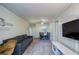 Inviting living room featuring wood floors, TV, and dining area at 2805 Ne Expressway Ne # B 16, Atlanta, GA 30345