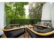 Cozy outdoor patio with comfortable seating, wooden deck and pleasant view at 2805 Ne Expressway Ne # B 16, Atlanta, GA 30345