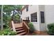 Back deck overlooking lush greenery and serene landscape at 5190 Southlake Dr, Alpharetta, GA 30005