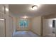 Carpeted bedroom with two windows at 5190 Southlake Dr, Alpharetta, GA 30005