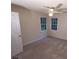 A bedroom with carpet, ceiling fan and natural light at 5190 Southlake Dr, Alpharetta, GA 30005