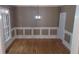 Cozy dining room featuring elegant trim, chandelier, and hardwood floors at 5190 Southlake Dr, Alpharetta, GA 30005