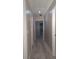 This is a hallway with neutral paint at 5190 Southlake Dr, Alpharetta, GA 30005