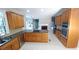 Open kitchen showcasing granite countertops, stainless steel appliances, and wooden cabinets at 5190 Southlake Dr, Alpharetta, GA 30005