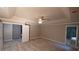 This spacious bedroom features neutral walls, plush carpet, and a ceiling fan at 5190 Southlake Dr, Alpharetta, GA 30005
