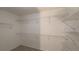 Walk-in closet with white walls and wire shelving at 5190 Southlake Dr, Alpharetta, GA 30005