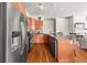 Well-equipped kitchen with stainless steel appliances, wood cabinets, and granite counters blending style and functionality at 1376 Parkview Ne Ln, Atlanta, GA 30324