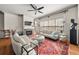 Spacious living room with fireplace, hardwood floors, and stylish furniture showcasing a cozy ambiance at 1376 Parkview Ne Ln, Atlanta, GA 30324