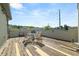 Outdoor rooftop deck with a dining table set, perfect for enjoying city views and entertaining guests at 1376 Parkview Ne Ln, Atlanta, GA 30324