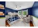 bedroom featuring a bunk bed, slide, and sitting area at 176 Rockyford Ne Rd, Atlanta, GA 30317