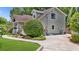 Home featuring lots of parking space, an arched window, and verdant landscaping at 176 Rockyford Ne Rd, Atlanta, GA 30317