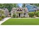 Delightful home with dormer windows, a welcoming porch, and a neatly kept front lawn at 176 Rockyford Ne Rd, Atlanta, GA 30317
