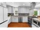 Bright kitchen showcasing stainless appliances, ample cabinet space, and sleek countertops at 176 Rockyford Ne Rd, Atlanta, GA 30317