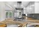 Bright kitchen showcasing stainless appliances, ample cabinet space, and sleek countertops at 176 Rockyford Ne Rd, Atlanta, GA 30317