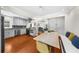 Bright kitchen with stainless steel appliances, light gray cabinetry and adjacent dining area at 176 Rockyford Ne Rd, Atlanta, GA 30317
