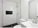 Bathroom with black tile shower, toilet, and vanity with sink at 3611 Radcliffe Blvd, Decatur, GA 30034