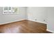 Bedroom with hardwood floors and a window at 3611 Radcliffe Blvd, Decatur, GA 30034