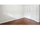 Bedroom featuring hardwood floors and a closet with shutter doors at 3611 Radcliffe Blvd, Decatur, GA 30034