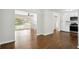 Open concept featuring hardwood floors, kitchen and large windows at 3611 Radcliffe Blvd, Decatur, GA 30034