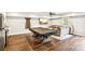 Finished basement with a billiards table, sectional sofa, and kitchenette area at 2755 Evan Manor Ln, Cumming, GA 30041