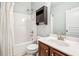 Bathroom featuring a shower-tub combination and a stylish vanity with a modern faucet at 2755 Evan Manor Ln, Cumming, GA 30041