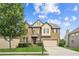 Charming two-story brick home with a well-manicured lawn and attached two-car garage at 2755 Evan Manor Ln, Cumming, GA 30041