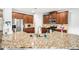 Spacious kitchen features granite countertops and stainless steel appliances, perfect for cooking at 2755 Evan Manor Ln, Cumming, GA 30041