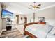 Large main bedroom features a ceiling fan, and generous space for a desk or sitting area at 2755 Evan Manor Ln, Cumming, GA 30041