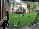 Large backyard with lush green lawn, swing set, and a view of the house's deck and exterior at 3641 Bramblewood Way, Marietta, GA 30062