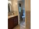 Updated bathroom with wood vanity, granite countertop and a view into the toilet space at 3641 Bramblewood Way, Marietta, GA 30062