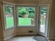 Bright breakfast nook with a bay window and access to the deck at 3641 Bramblewood Way, Marietta, GA 30062