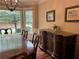 Dining room with natural light, featuring hardwood floors and a custom-built buffet at 3641 Bramblewood Way, Marietta, GA 30062