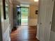 Bright foyer with hardwood floors, painted walls, and front door with glass accents allowing for natural light at 3641 Bramblewood Way, Marietta, GA 30062