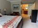 Inviting carpeted main bedroom with a view into an ensuite bathroom at 3641 Bramblewood Way, Marietta, GA 30062