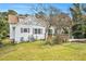 Exterior featuring a deck, garden, and partially visible patio at 4141 Willow Ridge Rd, Douglasville, GA 30135
