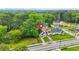 Charming traditional home with lush green trees, manicured lawn, and a long driveway at 623 Hamilton E Holmes Nw Dr, Atlanta, GA 30318
